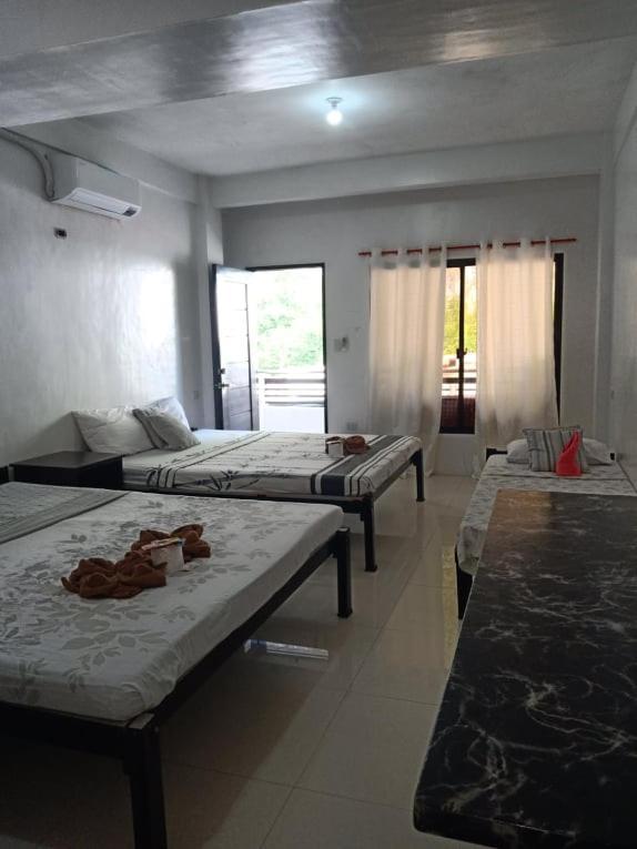Chelle'S Apartelle-Inn El Nido Exteriör bild